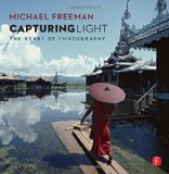 Portada de CAPTURING LIGHT: THE HEART OF PHOTOGRAPHY BY FREEMAN, MICHAEL (2014) PAPERBACK